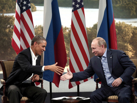 US President Barack Obama and Russian President Vladimir Putin shake hands during their meeting at the G8 Summit at Lough Erne in Enniskillen, Northern Ireland, June 17, 2013 (Credit: Reuters/Kevin Lamarque)