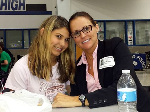 Shea Shawhan, a victim of bullying, with her mother, Keri Riddell, in the Plano West High School cafeterial where Shea is a junior (Credit: Keri Riddell via Facebook)