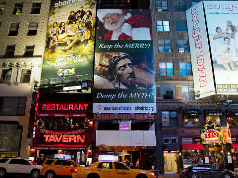 Atheist billboard campaign for Christmas 2012, Keep the Merry! Dump the Myth - billboard in New York City (Credit: Robyn Lee via Flickr)