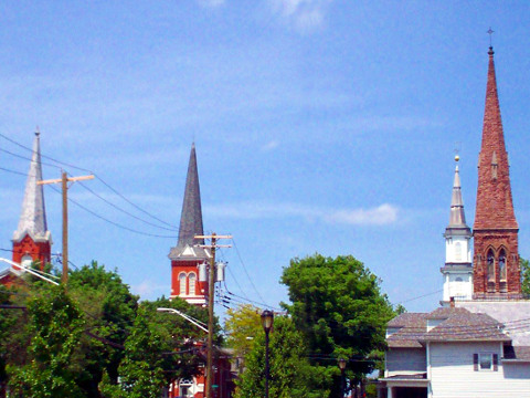 View of the steeples of the four churches at the intersection of Church Street, Canandaigua Street, East Main Street and West Main Street in Palmyra, New York (Credit: Jon Ridinger via wikitravel.org)