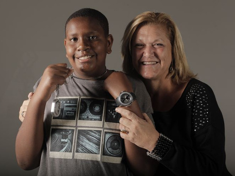 Davion Navar Henry Only poses for a photo with Connie Going, Eckerd adoption specialist (Credit: Tampa Bay Times/Melissa Lyttle)