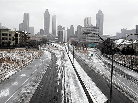 The road is empty leading out of downtown Atlanta as drivers heeded advice to not drive during an ice storm in Atlanta Feb. 12, 2014 (Credit: Reuters/Tami Chappell)