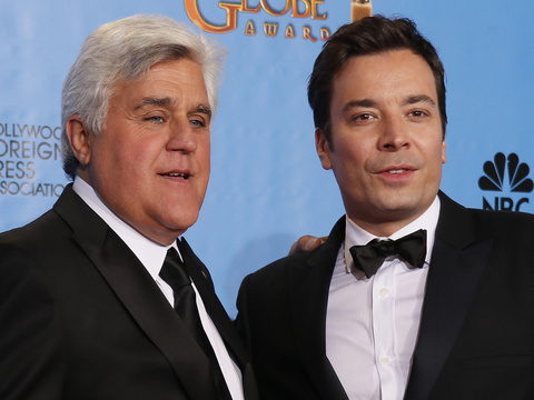 Late night talk show hosts Jay Leno (L) and Jimmy Fallon pose backstage at the 70th annual Golden Globe Awards in Beverly Hills, California, January 13, 2013 (Credit: Reuters/Lucy Nicholson)