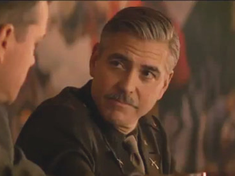 George Clooney, director and star of The Monuments Men, speaking with co-star Matt Damon (Credit: Sony Pictures)
