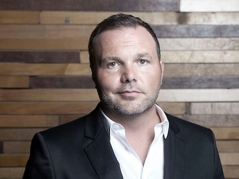 Mark Driscoll, preaching pastor of Mars Hill Church, poses for a photo in front of a wooden wall at the church (Credit: Mark Driscoll via Facebook)