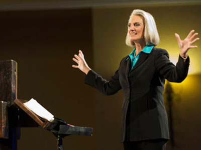 Anne Graham Lotz on stage teaching at a Just Give Me Jesus Conference (Credit: AnGeL Ministries)