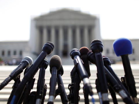 News microphones wait to capture reactions from Supreme Court rulings outside the court building in Washington, June 25, 2013 (Credit: Reuters/Jonathan Ernst)