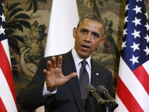 U.S. President Barack Obama speaks as he and President Bronislaw Komorowski of Poland hold a news conference after their meeting at Belweder Palace in Warsaw June 3, 2014 (Credit: Reuters/Kevin Lamarque)