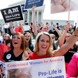 Pro-life supporters with Concerned Women for America celebrate the Hobby Lobby victory at the Supreme Court in Washington on June 30, 2014 (Credit: Reuters/Jonathan Ernst)