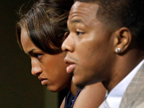 Janay Rice, left, looks on as her husband, Ravens running back Ray Rice, speaks during a news conference Friday at the team's practice facility in Owings Mills, Md. Rice spoke to the media for the first time since his arrest for assaulting his then-fiancee at a casino in Atlantic City, NJ, May 23, 2014 (Credit: AP/Patrick Semansky)