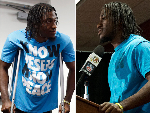 Redskins quarterback Robert Griffin III at a post game press conference before and after his T-shirt was turned inside out following the Washington Redskins 41-10 victory over the Jacksonville Jaguars, September 14, 2014 (Credit: AP/Evan Vucci)
