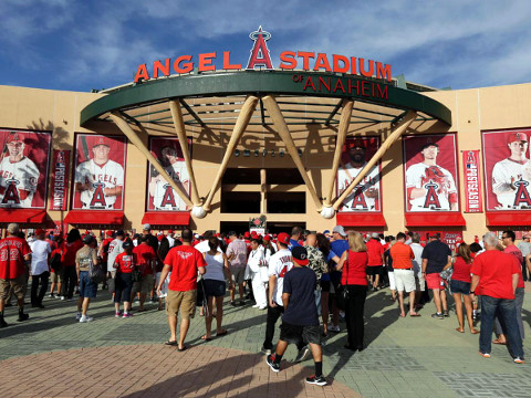 Fans enter Angel Stadium for American League Division Series Game 2 between the Royals and the Angels on Friday, October 3, 2014 (Credit: AP/Gregory Bull)