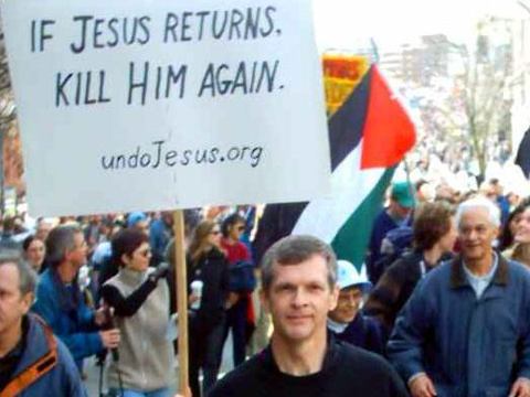 Darwin Bedford handing out anti-Bush leaflets warning fellow peace activists of America's Religious Right agenda, Vancouver, March 20, 2004 (Credit: Darwin Bedford)