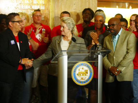 Mayor Annise Parker greets fellow HERO supporters at City Hall on Thursday before her address responding to a petition submitted for repeal of the anti-discrimination law. (Credit: HoustonPress/Susan Du)