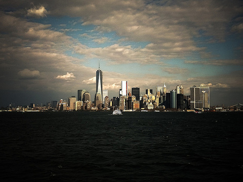 New York City daytime landscape with its nearly completed One World Trade Center skyscraper, November 10, 2013 (Credit: Roman Iakoubtchik via Flickr)