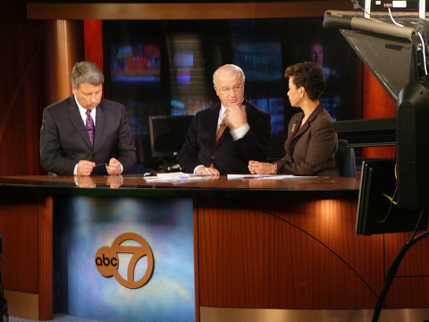 The WJLA Channel 7, the greater Washington DC area ABC affiliate, news anchors (L-R) Tim Brant, Gordon Peterson and Maureen Bunyan discuss the news while on the air, February 7, 2007 (Credit: Scott S via Flickr)