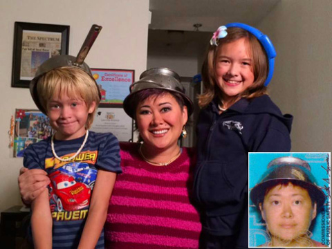 Asia Lemmon, whose legal name is Jessica Steinhauser, 41, of St. George, Utah, who had her Utah driver's license photo taken wearing a colander, the official headgear of the Church of the Flying Spaghetti Monster, poses for a photo with her children wear pots and pans on their heads (Credit: KUTV/Jessica Steinhauser)