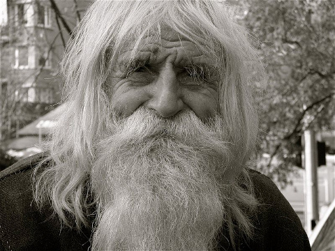 Dobri Dimitrov Dobrev, born 20 July 1914, better known as Grandpa Dobri, Elder Dobri, or The Saint of Bailovo, a Bulgarian ascetic who walks several kilometers each day to sit or stand in front of the Cathedral of Alexander Nevsky in Sofia to collect money for charitable causes pauses for a photo (Credit: Unknown)