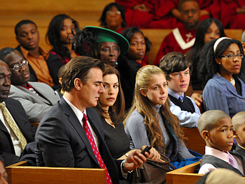 Chris Noth as Peter Florrick texting during a church service in a scene from the episode Boom of CBS's The Good Wife (Credit: CBS)