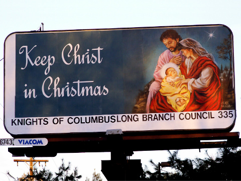 A billboard from the Long Beach Knights of Columbus Council with Jesus, Mary and Joseph in the classic manger scene with encouragement to Keep Christ in Christmas, Long Beach, New Jersey, December 20, 2005 (Credit: Jackie via Flickr)