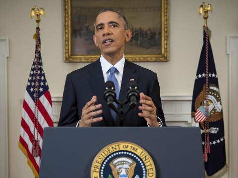 President Barack Obama announces a shift in policy toward Cuba while delivering an address to the nation from the Cabinet Room of the White House in Washington, December 17, 2014. (Credit: Reuters/Doug Mills)