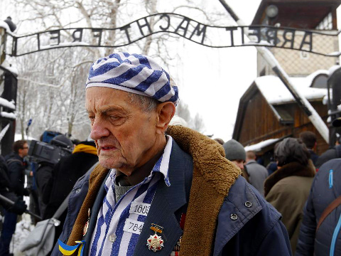 Igor Malicki of Ukraine, a survivor of the former German Nazi concentration and extermination camp Auschwitz reacts as he visits the camp in Oswiecim as part of commemoration ceremonies on the 70th anniversary of the liberation of the camp, January 26, 2015 (Credit: Reuters/Laszlo Balogh)
