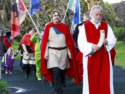 High priest of the Asatru Association, Hilmar Orn Hilmarsson, leads a procession of fellow members of the Asatru Association, a contemporary Icelandic pagan society, at the Pingvellir National Park near Reykjavik June 21, 2012 (Credit: Reuters/Silke Schurack)