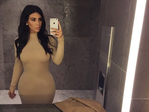 Kim Kardashian takes a selfie with her iPhone in her bathroom before a date night in New York City, December 2014 (Credit: Kim Kardashian via Instagram)
