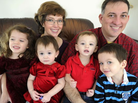 The Watts family - Shelby, Angelina, mother Angel, Charles, Alexander and father Jeff - pose for a family photo while enjoying an afternoon at home (Credit: The Tennessean/George Walker IV)