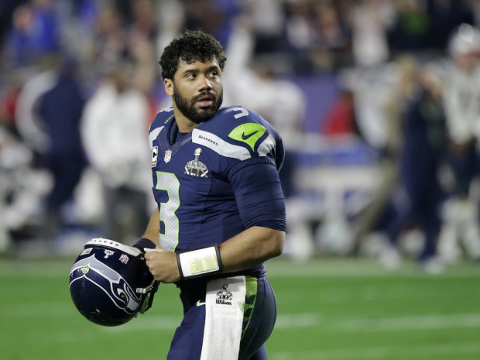 Seattle Seahawks quarterback Russell Wilson (3) looks back after throwing an interception to New England Patriots strong safety Malcolm Butler during the second half of NFL Super Bowl XLIX football game Sunday, February 1, 2015, in Glendale, Arizona (Credit: AP/David Goldman)