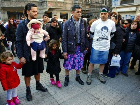 Turkish men in skirts protested violence against women in central Istanbul, on February 21, 2015, after the brutal death of 20-year-old Ozgecan Aslan, who resisted an attempted rape by a bus driver in the southern city of Mersin, Turkey, February 21, 2015 (Credit: Reuters/Murad Sezer)