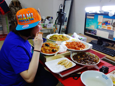 Rachel Ahn, who goes by 'Aebong-ee,' is among the top 100 most-watched mukbang stars in South Korea. (Credit: NPR/Elise Hu)