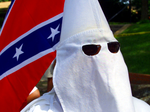 Ku Klux Klan member during a demonstration in Huntsville, Texas on June 22, 2000 (Credit: Reuters/Adrees Latif)