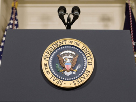 The Presidential Seal is seen on a podium at the White House in Washington (Credit: Reuters/Larry Downing)