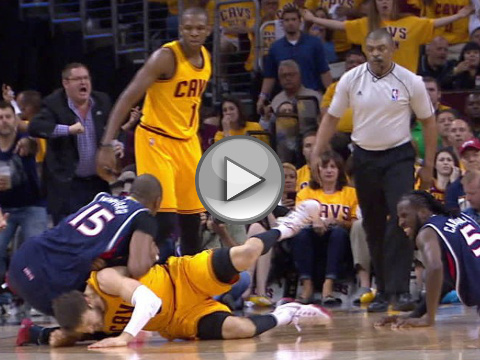 Atlanta Hawks center Al Horford (15) appears to elbow Cleveland Cavaliers guard Matthew Dellavedova during a scramble fpr a loose rebound during the second quarter of game 3 of the Eastern Conference finals of the NBA basketball playoffs, Sunday, May 24, 2015, in Cleveland (Credit: NBA/TNT)