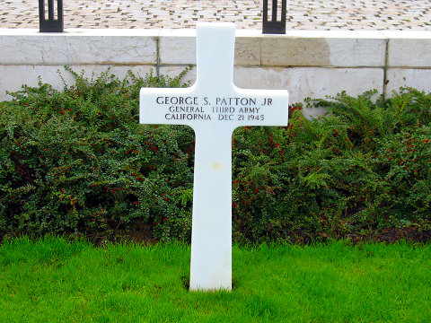 General George S. Patton was buried at the Luxembourg American Cemetery and Memorial in Hamm, Luxembourg, alongside wartime casualties of the Third Army, per his request to 'be buried with my men.' (Credit: Michel Dieleman via en.wikipedia.org)