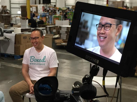 Chieh Huang, CEO of Boxed.com, on online wholesale shopping company, during an interview at the company's warehouse for an Everyday Heroes segment on Good Morning America (Credit: GMA/Boxed.com via Twitter)