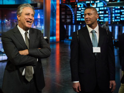 Jon Stewart with veterans who attended a job fair at the studio for 'The Daily Show' this month. (Credit: The New York Times/Todd Heisler)