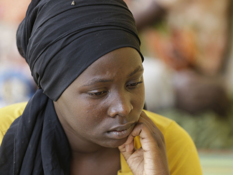 At a refugee camp, following her rescue by Nigerian soldiers from the Sambisa Forest, Binta Ibrahim describes how she trekked for two days from Nbitha to Boko Haram's hideout in the Sambisa Forest with 2-year-old Matthew and 4-year-old Elija Yohanna strapped to her back and 4-year-old Maryam Samaila clinging to her waist, Yola, Nigeria Monday, May 4, 2015 (Credit: AP Photo/Sunday Alamba)