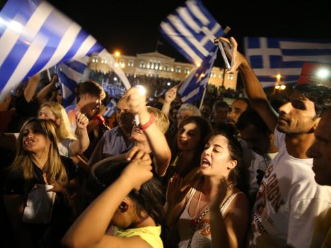 Supporters of the Syriza party and No vote campaign after results of the referendum in Athens, Greece, July 5, 2015(Credit: AP Images/Kay Nietfeld)