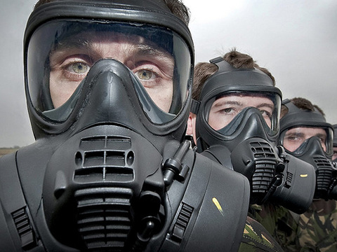 Gunners of 26 Squadron (Sqn) Royal Air Force (RAF) Regiment based at RAF Honington wearing the GSR10 gas mask during an exercise, February 9, 2011 (Credit: UK Ministry of Defence/Cpl Dylan Bob Browne via Flickr)