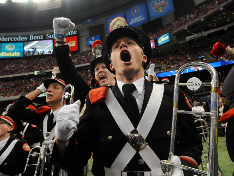 Ohio State University band members celebrate during the 2015 College Football Playoff Semifinal at the 81st Allstate Sugar Bowl at the Mercedes-Benz Superdome, January 1, 2015 (Credit: AP Images/Cheryl Gerber)