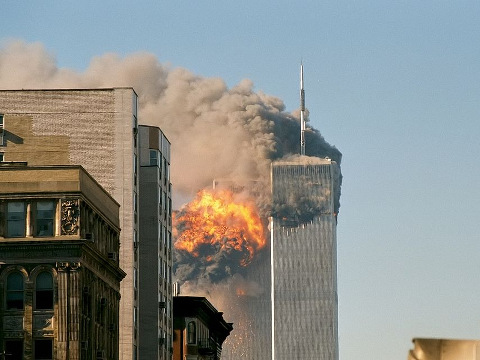 A fireball erupts in the South Tower of the World Trade Center after the Islamic terrorist group Al-Qaeda hijacked four passenger airliners, two of which were flown directly into the World Trade Center (Credit: Robert J Fisch via Flickr)
