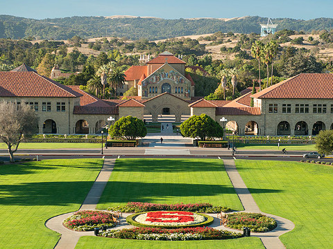 An aerial view from a bucket truck of the Oval and the front of the Main Quad at Stanford University (Stanford News Service/L.A. Cicero)