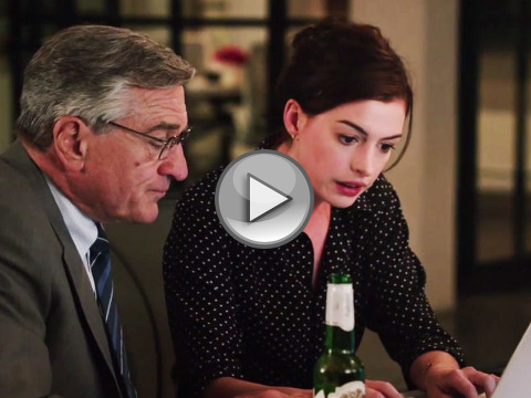 Robert De Niro as Ben Whittaker, a widower and retired executive from a phone directory company, who serves as intern to Jules Ostin, founder and CEO of About the Fit, a fast-growing e-commerce fashion company, played by Anne Hathaway in an office scene where the two discuss how to use Facebook in the new Warner Brothers movie The Intern (Credit: Warner Brothers Pictures)