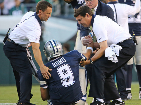 Dallas Cowboys staff lift injured quarterback Tony Romo (9) during the third quarter of game between the Dallas Cowboys and the Philadelphia Eagles at Lincoln Financial Field in Philadelphia, September 20, 2015 (Credit:Icon Sportswire/Zuma Press/Paul Moseley)