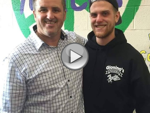 Pizza deliveryman, Jeff Louis, poses for a photo with Ken Wright, pastor of Life Point Church, after the church congregation tipped Louis $700 after a Sunday morning deliverly, Mentor, Ohio, November 22, 2015 (Credit: Life Point Church)