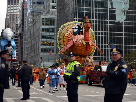 Macy's Thanksgiving Day Parade 2014 - turkey float with two pilgrims atop it as seen from Bryant Park at the corner of West 41st Street and 6th Ave, New York City, November 27, 2014 (Credit: S Pakhrin via Flickr)