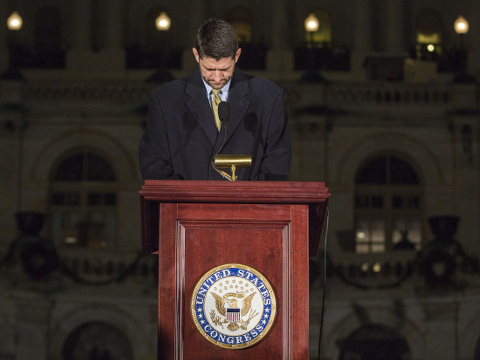 House Speaker Paul Ryan holds a moment of silence for the ongoing shooting situation in San Bernardino, California, during the annual U.S. Capitol Christmas Tree lighting ceremony on the West Front of the U.S. Capitol in Washington, December 2, 2015 (Credit: AP Images/CQ Roll Call/Al Drago)