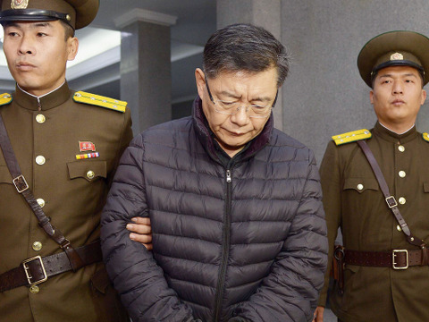 Canadian pastor Hyeon Soo Lim (C) enters North Korea's top court in Pyongyang on Dec. 16, 2015. The court sentenced him to life in prison with hard labor for what it claimed to be anti-state acts. (Credit: AP Images/Kyodo)